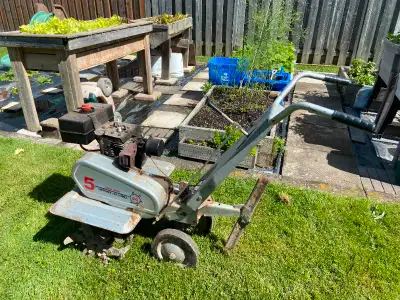 CRATFTSMAN FRONT TILL 5HP 200CC 24 " TILLING WIDTH ADJUSTABLE DEPTH BAR FORWARD/REVERSE $500 or best...