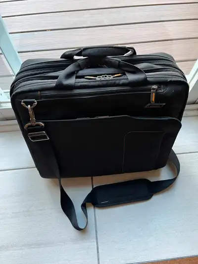 Selling expandable rolling briefcase (2 wheels) and expandable briefcase. Both in new condition with...