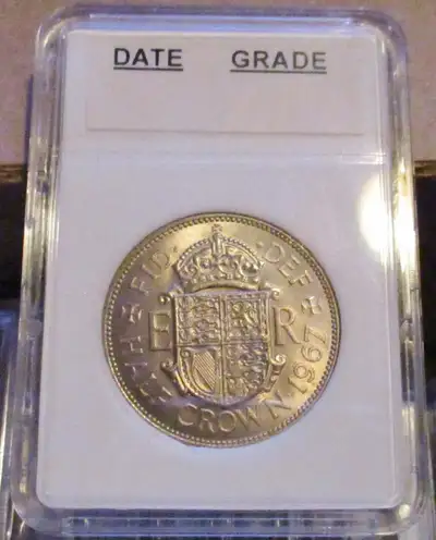 1967 1/2 CROWN FROM THE UK IN VERY GOOD CONDITION IN PROTECTIVE SLAB