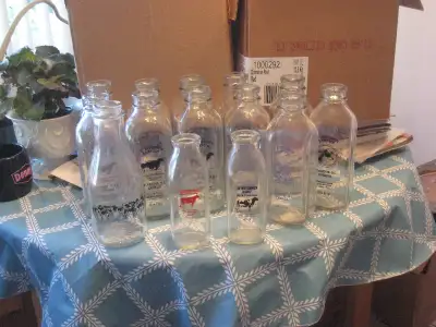 We have 13 vintage glass milk bottles from the “D” Dutchmen Dairy. Eleven of the bottles are the squ...