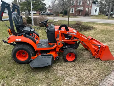 Selling this Kubota BX 2380 with 335hr 23HP diesel 4x4 power steering and 3pt hitch, high back seat...