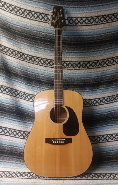 Takamine EF-340 in excellent playing condition. It is nicely set up with bone nut, saddle and bridge...