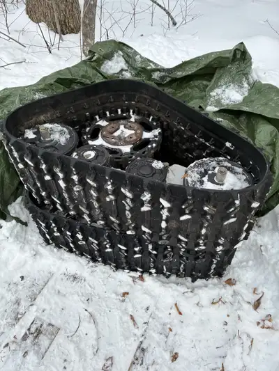 Set of all season CAT TRAX with mounts in very good condition off a 700 prowler. Also a very good se...