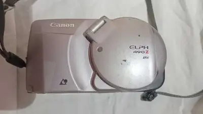 Canon Elph 490Z Film Camera- I have lots of cameras here, View more