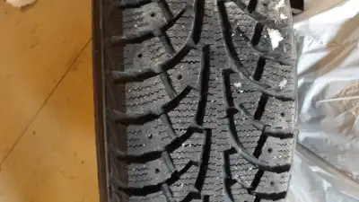 four 195-65-15 hankook winter pike snow tires on vw rims. bolt pattern 5x 112. asking $500 on vw rim...