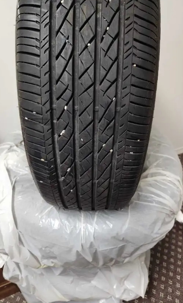 215 55 18 Bridgestone all season 11/32 tires 95% tread 215/55/18 in Tires & Rims in Calgary
