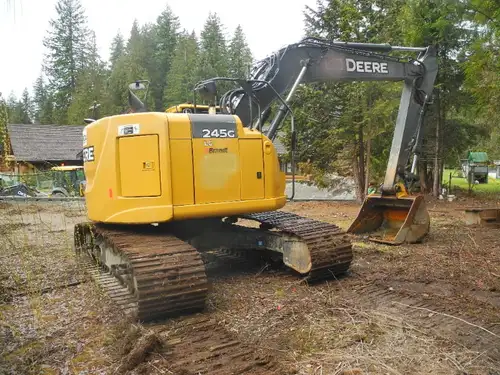 4750 Hours, A/C Cab, Auxiliary hydraulics, Hydraulic Wedge style Coupler with 36", 60" Buckets. Add...