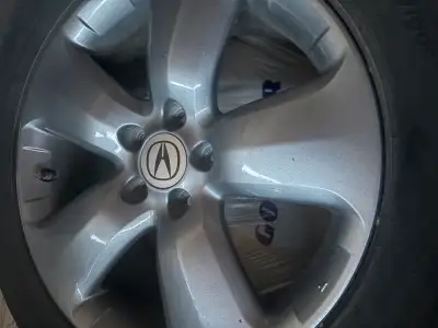 Original all season tires from my 2007 Acura RDX. 235/55R18 Selling as is. Tire thread is about 25%...