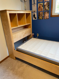 Twin bed frame with shelves and box spring