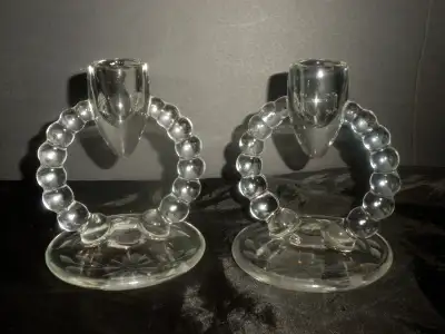 2 bougeoirs en verre dépression faits par Indiana Glass co., View more