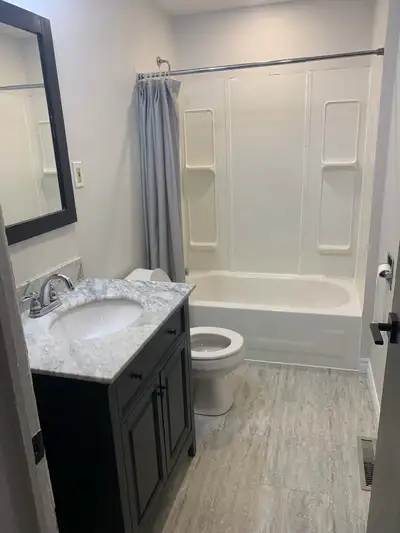 Apartment for rent inside shared house. On main level. Comes furnished - no bed. All utilities inclu...
