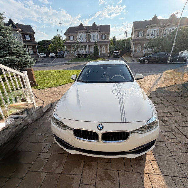 BMW 320i xdrive sedan — photo 2