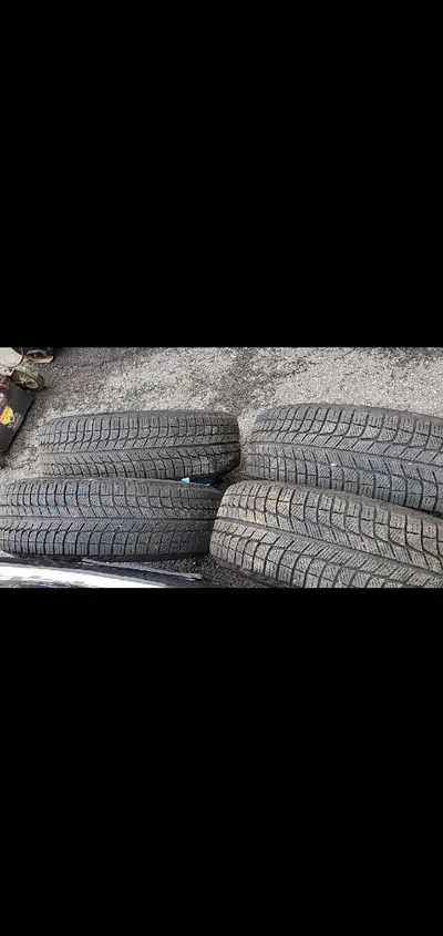 Michelin 215 65 R16 winter tires. Used for 1 season. Plenty of thread. 4 tires with rims. $350 Phone...