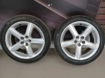 Selling set of 4 Toyota Matrix rims with 205/50R17 Greentrac Seasonmaster tires. Tires and rims are...