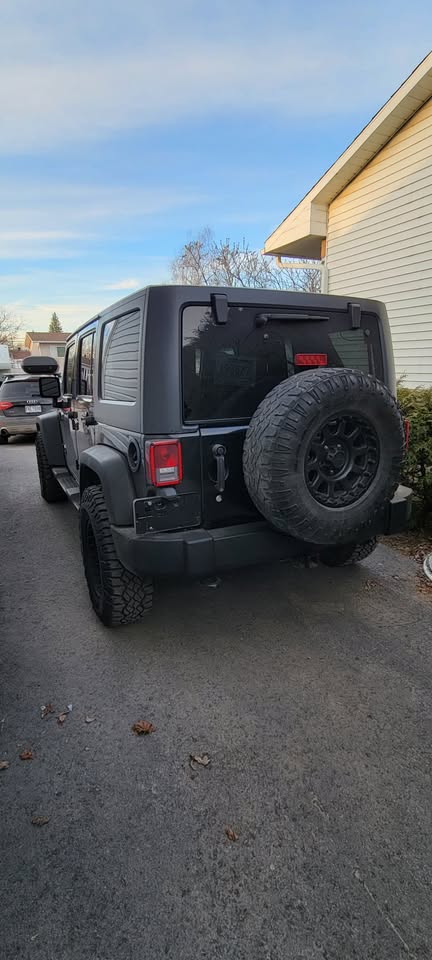 Jeep Wrangler Unlimited Sport 2014 — photo 3