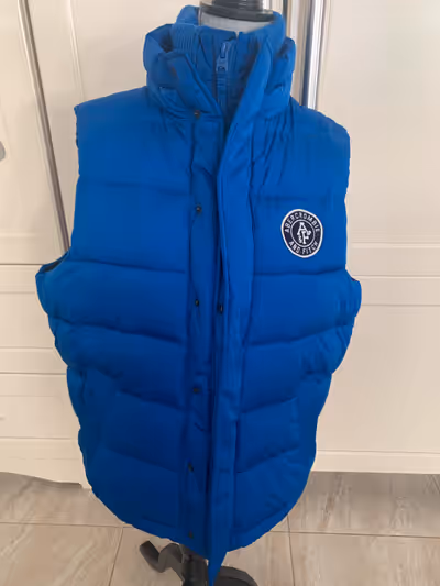 Size XL, industrial zipper and double snap closure to keep air out. High neck line with soft materia...