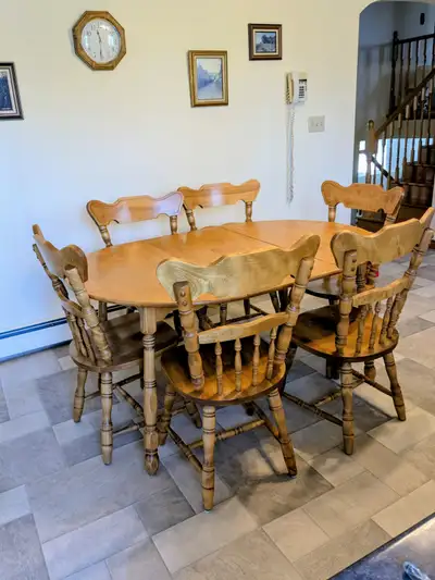 This sturdy is large enough to fit 6 chairs comfortably with the 16 inch insert. It is oblong for si...