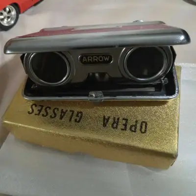 Enhance your theatre experience with these vintage Arrow opera glasses, featuring 3X magnification a...