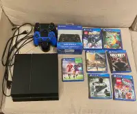 PS4 + 3 CONTROLLERS + 7 GAMES + 2 CONTROLLER CHARGER FOR $350