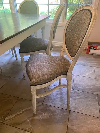Premium manufactured wood dining chairs. Antique off white finish. Timeless design. There a five ava...