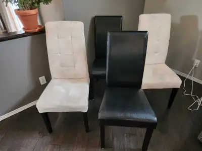 4 Chairs 2 - Black Faux Leather 2 - 'Cream' Micro Fiber Chairs are solid and in excellent aesthetic...