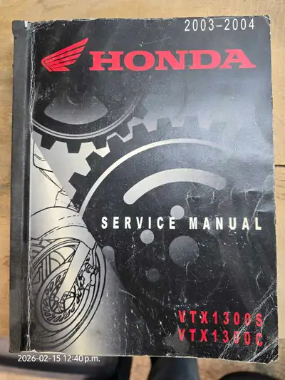 This is a used Honda VTX 1300 S/C service manual, covering the years 2003-2004, perfect for maintain...
