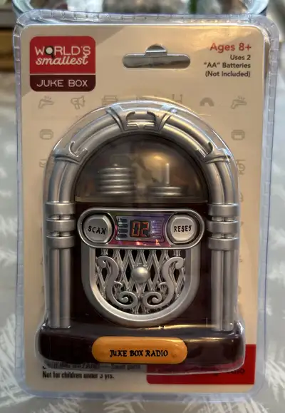 Miniature jukebox shaped radio. Plays radio. Requires two AA batteries (not included). For ages 8+....