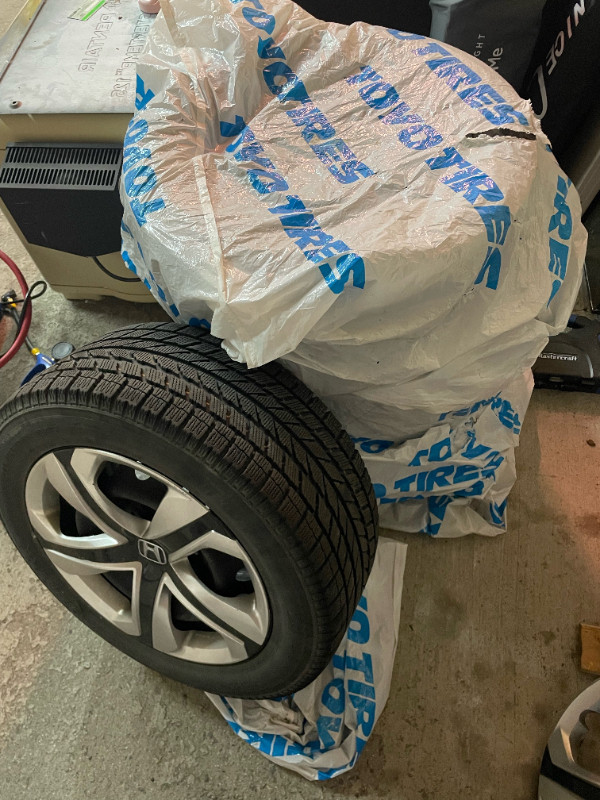 Honda Civic Winter Tires on Rims with ORIGINAL Honda Hub Caps Tires