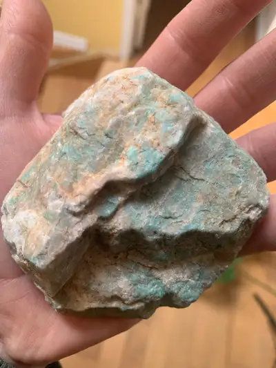Amazonite stone, showcasing its natural beauty and unique mineral composition. This piece is perfect...