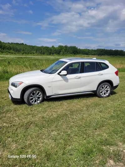 2112 BMW XI AWD in great condition with only 124800 kms,loaded with features including panoramic sun...