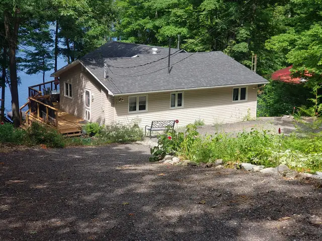 Waterfront True Turnkey Bungalow Walkout on Madawaska River