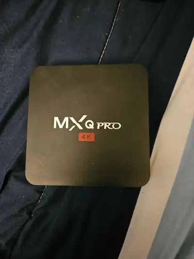 Android TV box. Turns a dumb TV into a smart TV. Access to play store, Netflix, prime, Disney +, etc...