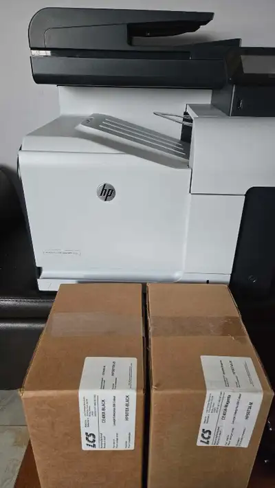 Really great printer, comes with toner cartridges in it already partly used as well as a Brand new b...