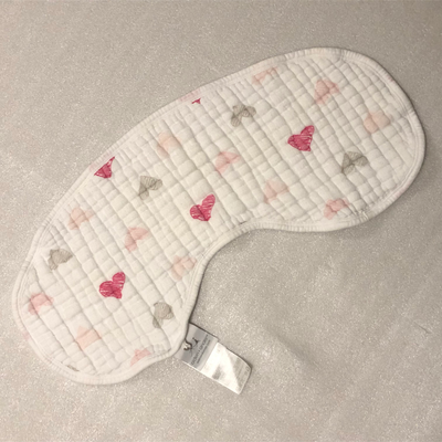Aden + Anais Burpy Bib, can double as a bib and burp cloth. Drape it over baby's shoulders and snap...