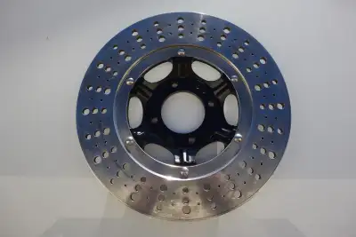 Selling a front rotor that fits many seventies Honda motorcycles with 4 bolt attachment. Professiona...