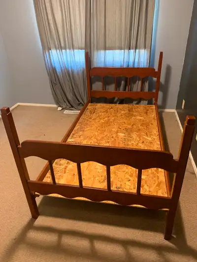 Wooden twin bed frame $50, View more