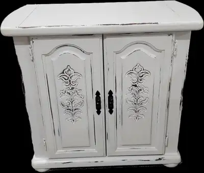Cabinet refinished white chalk paint and distressed, measures 29 inches high, 16 deep and 32 inches...