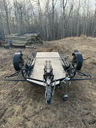 This portable and convenient motorcycle trailer is foldable and stands on end for easy storage. This...