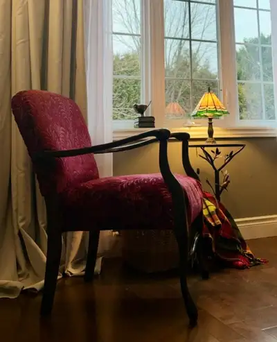 Gorgeous, handcrafted solid wood chair that is a beautiful statement piece in any living room. Downs...