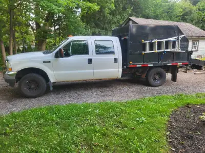 2004 f250 5.4l gas 4x4 automatic with dump box 245800km daily driven, kms will go up. New/used trans...