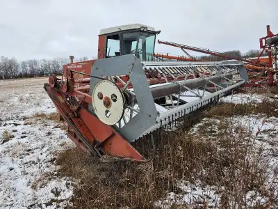Hesston 6450 swather 22 foot header, chrysler slant 6 engine, new header drive belt last fall, new e...