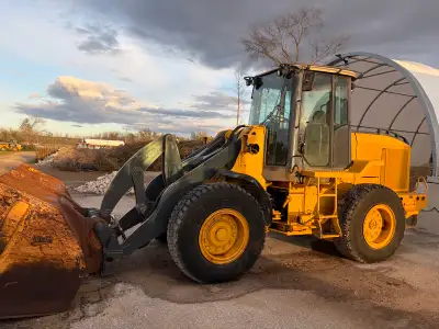 Snow tires, was repainted 3 years ago, 9400 hours. $65000 obo