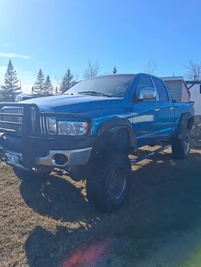 2003 Dodge Ram 2500 lifted with a 5.7 Hemi Gas Engine. Too many new parts to list Truck runs and dri...