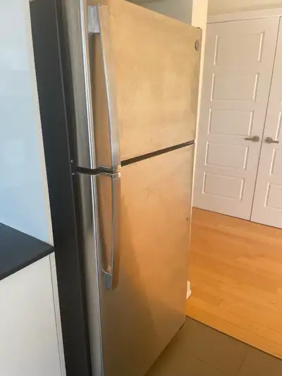 Stainless steel fridge, stove & over-the-stove microwave, View more