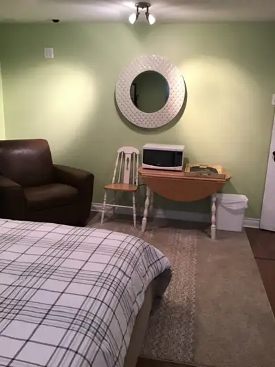 Lovely furnished room in the historic area of Bowmanville close to all shops & grocery stores. All u...