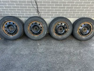 Well used tires. Still good traction. Haven’t reached wear indicators. Rusted rims. Priced to sell....