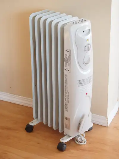 Garrison NY15EC-7 on-the-wheels floor heater. Power 1500W. Temperature control function. Low and hig...
