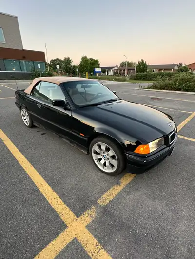 selling .bmw 318i 1999 convertible runs drive engine transmission good no light on dash no oil leaks...