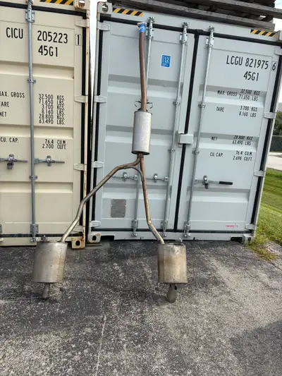 This is a genuine Honda Yutaka exhaust system assembly. It is a pre-owned part that shows signs of u...