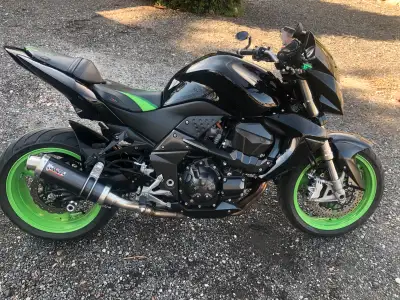 This 2007 Kawasaki Z1000 Street fighter is a real head-turner, featuring a powerful engine and aggre...